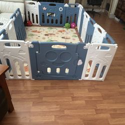 16-Panel Baby Playpen + Gate + Activity Panel + Mat – $180 OBO