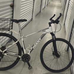 White Giant mountain bike with 700c tires