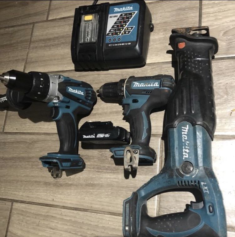 Makita set 18 volt sawzelll Hammer drill and Drill with battery and charger