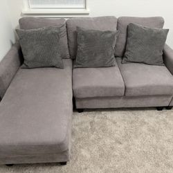 Sofa With Chaise And Cushions