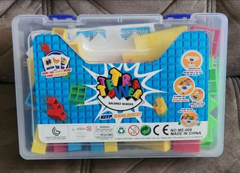 Tetra Tower balance blocks game set featuring colorful stacking pieces