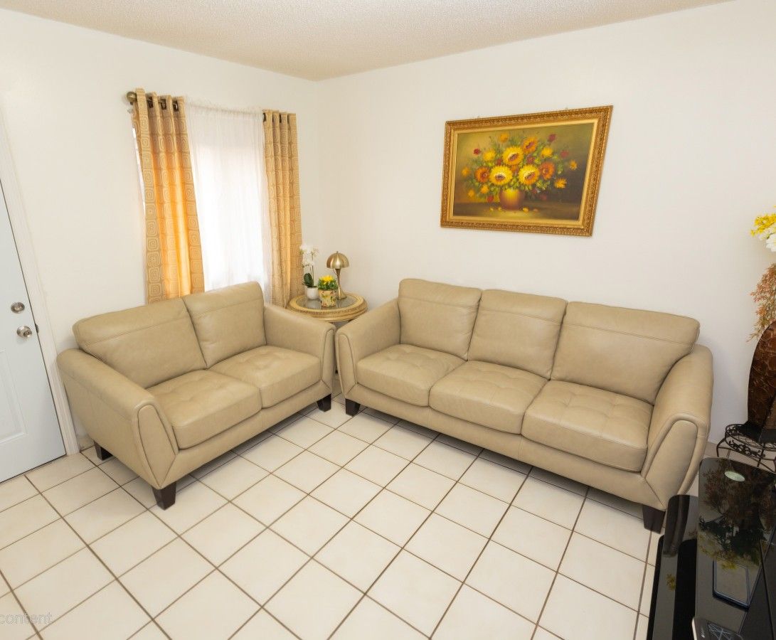 Rooms to go Loveseat 2 Sofa Set - Two and Three seat.