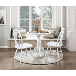 Brand new white round dining table (32"x32"x30"H) + 4 Wooden Chairs (17" x 20" x 35"H)