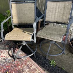 2   tall out side chairs 