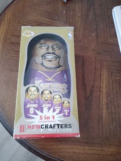 This item is a 2003 NewCrafters Nesters Limited Edition NBA Los Angeles Lakers 5-in-1 nesting doll set.