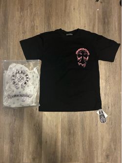 black t-shirt with pink dripping cross graphic