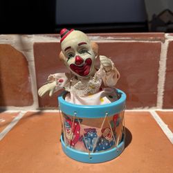 Antique music box clown