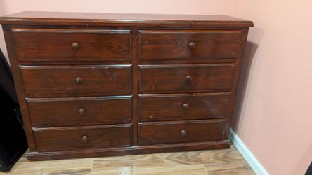 Solid wood dresser. Eight drawers