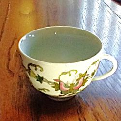 "Tea cups (3),  Jingdezhen porcelain teacup from China, specifically featuring a hand-painted butterfly and flower design belongs to the Famille Rose 