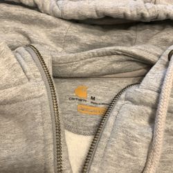 Grey 1/2 zip Carhartt hoodie size med.