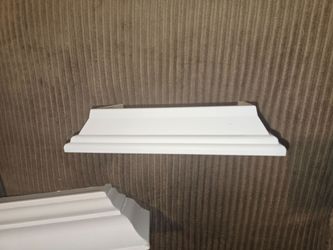 White Floating Wall Shelf with Molding Detail