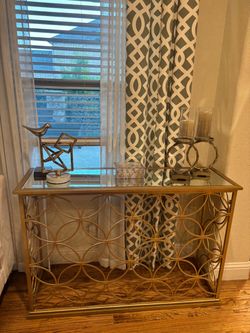 Gold mirror top console