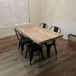 Wooden Table With 4 Black Chairs 