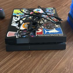 PS4 With Controllers And Games