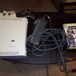 XBox 360 w/ 2 controllers, 6 games