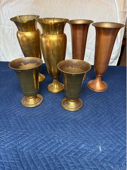Brass vases.