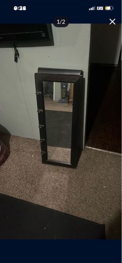 Mirror with coat hooks