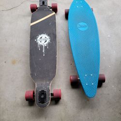 2 Long board skateboards (both hardly used - sold separately)