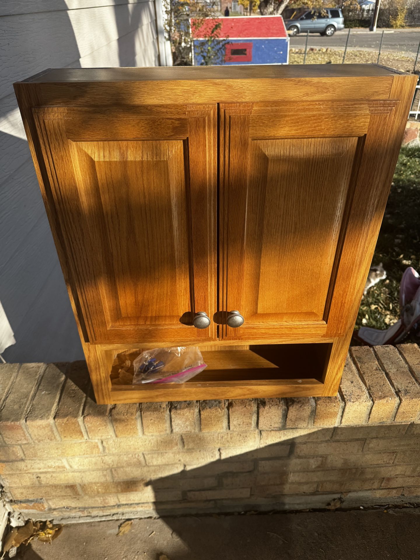 Bathroom cabinet with hardware.