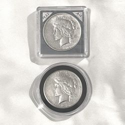 About Uncirculated-AU(50)  Sealed In Capsules 1922 And 1923 Piece Silver Dollars. Valued $97 Each On Us Coin Book. I’ll Accept $85 Each.