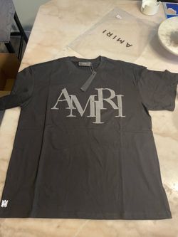 Black and gray logo T