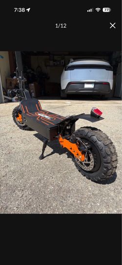 4,000 watt dual motor off-road scooter with dual headlights & suspension (BNIB)