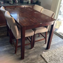 Wooden Table With Four Chairs