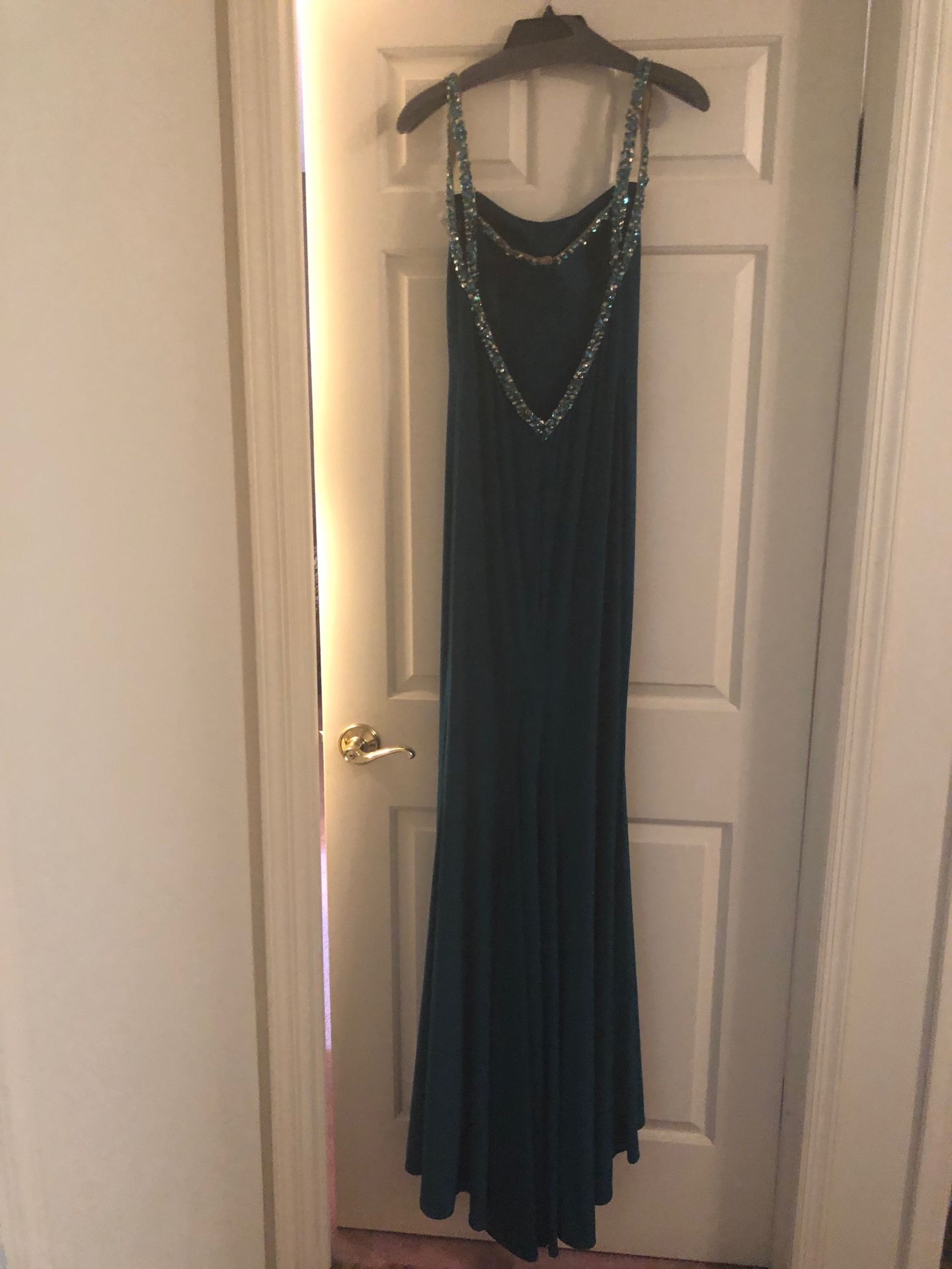 Brand New Faviana Evening gown. Size 4.