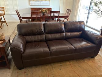 Sofa love seat and 2 chairs with foot rests