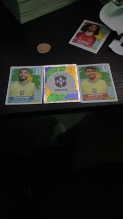 Matheus Cunha the Brazil badge card and Lucas paqueta