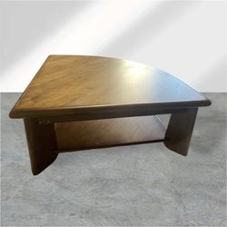 Pie shaped lift coffee table