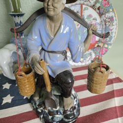 Oriental Man Carrying Water jugs It's In Great Condition 