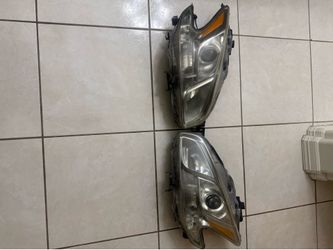 09-14 Nissan Maxima headlights