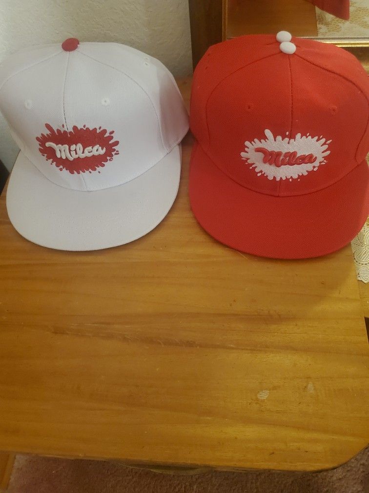 4 Brand New Milca Snapbacks 2 Red And 2 White Each At $15