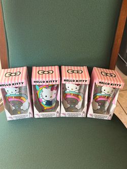 four Hello Kitty cups NEW