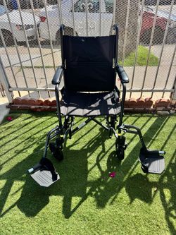 Black Transport Wheelchair with Footrests