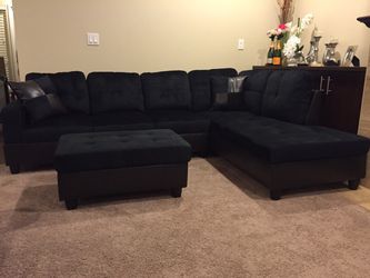 Black microfiber sectional couch and ottoman