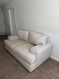 Loveseat and pillows