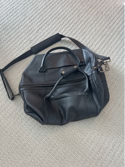 Quince and Coach Leather