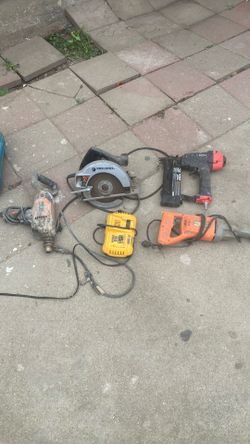 Cord Tools And A De Walt Charger Take All