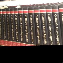 Collier's Encyclopedia, a highly regarded American general reference set. Specifically, the visible "Collier's Year Book" is from 1983.