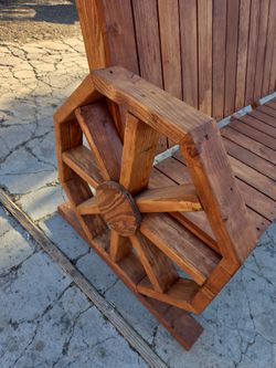 Wooden bench with Wagon Wheel