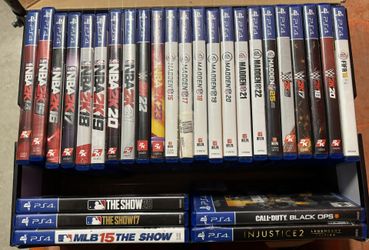 PS4 with 2 Controllers & 28 Games