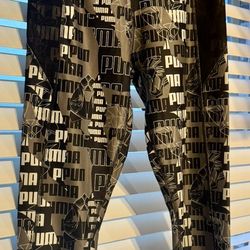 PUMA Women’s Geometric Logo Capri Leggings – Black/White – Size M (Runs Small)