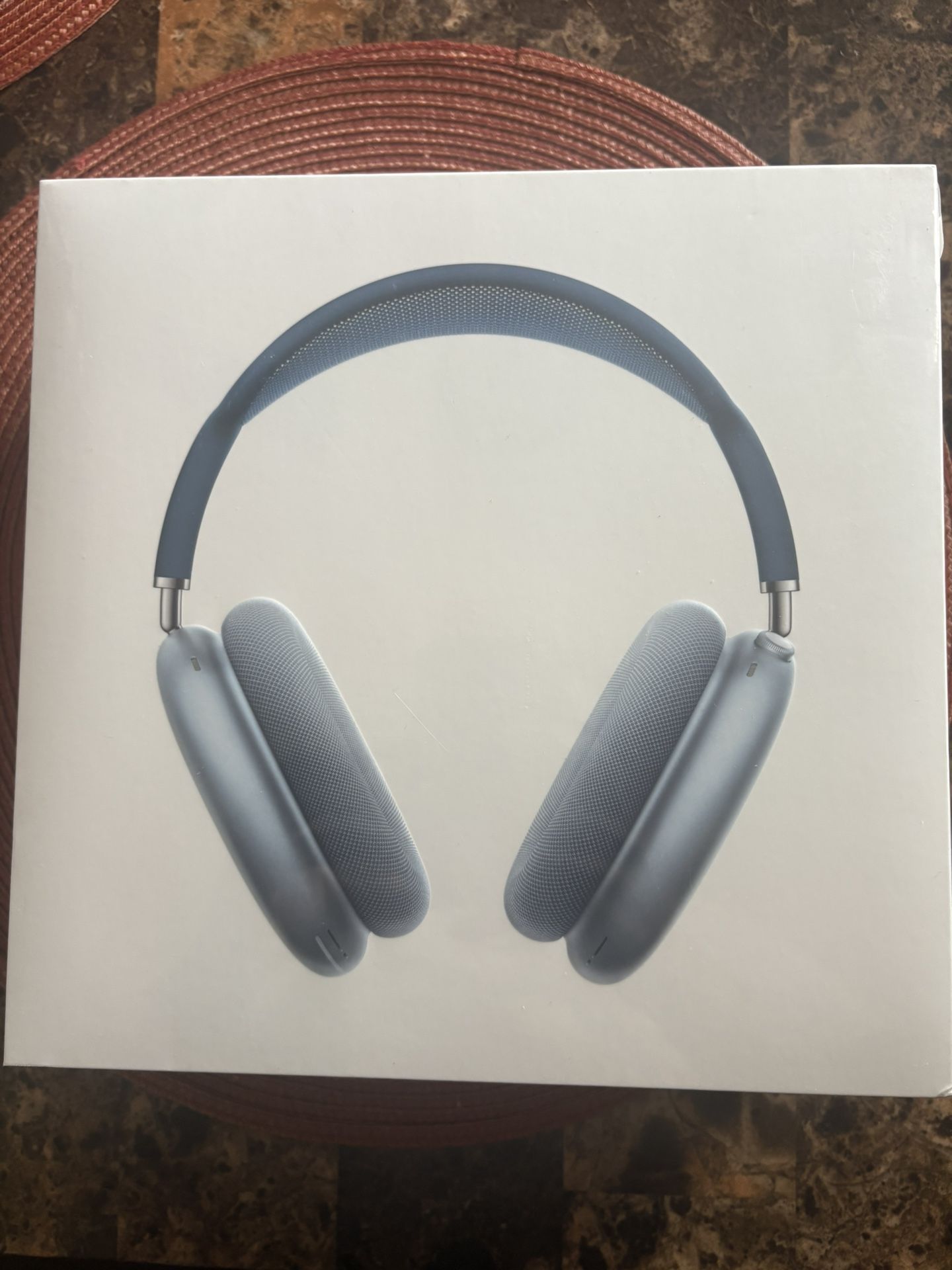 Apple AirPods Max wireless over-ear headphones in the sky blue color