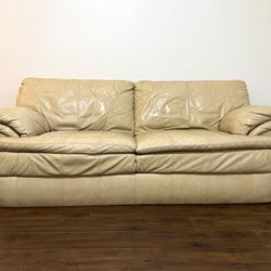 Comfortable leather sofa, Pet/smoke-free, $45