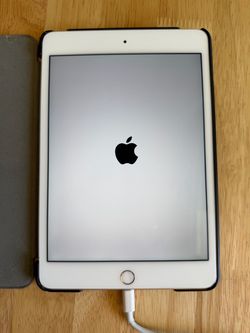 Apple iPad Mini 4 (64GB, Wi-Fi) + Folio Case