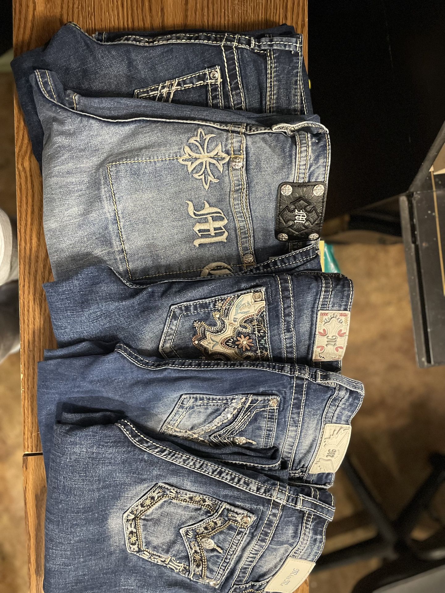 Miss Me Jeans 28 waist 32-34 Lengths Boot Cut 1 Skinny And 1 Wide Leg Most Have Only Been Worn Once And 2 Pairs Never Worn