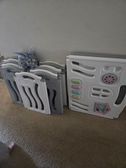 Children's gate six by four by six by four and a musical toddler, sit in and stand up playtoy.