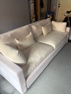 Large White Fabric Sofa with Throw Pillows